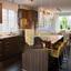 A kitchen with an island and bar stools..jpg